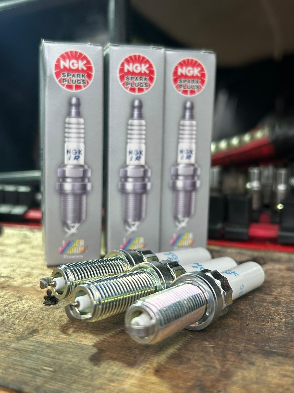 New spark plugs prepared for installation