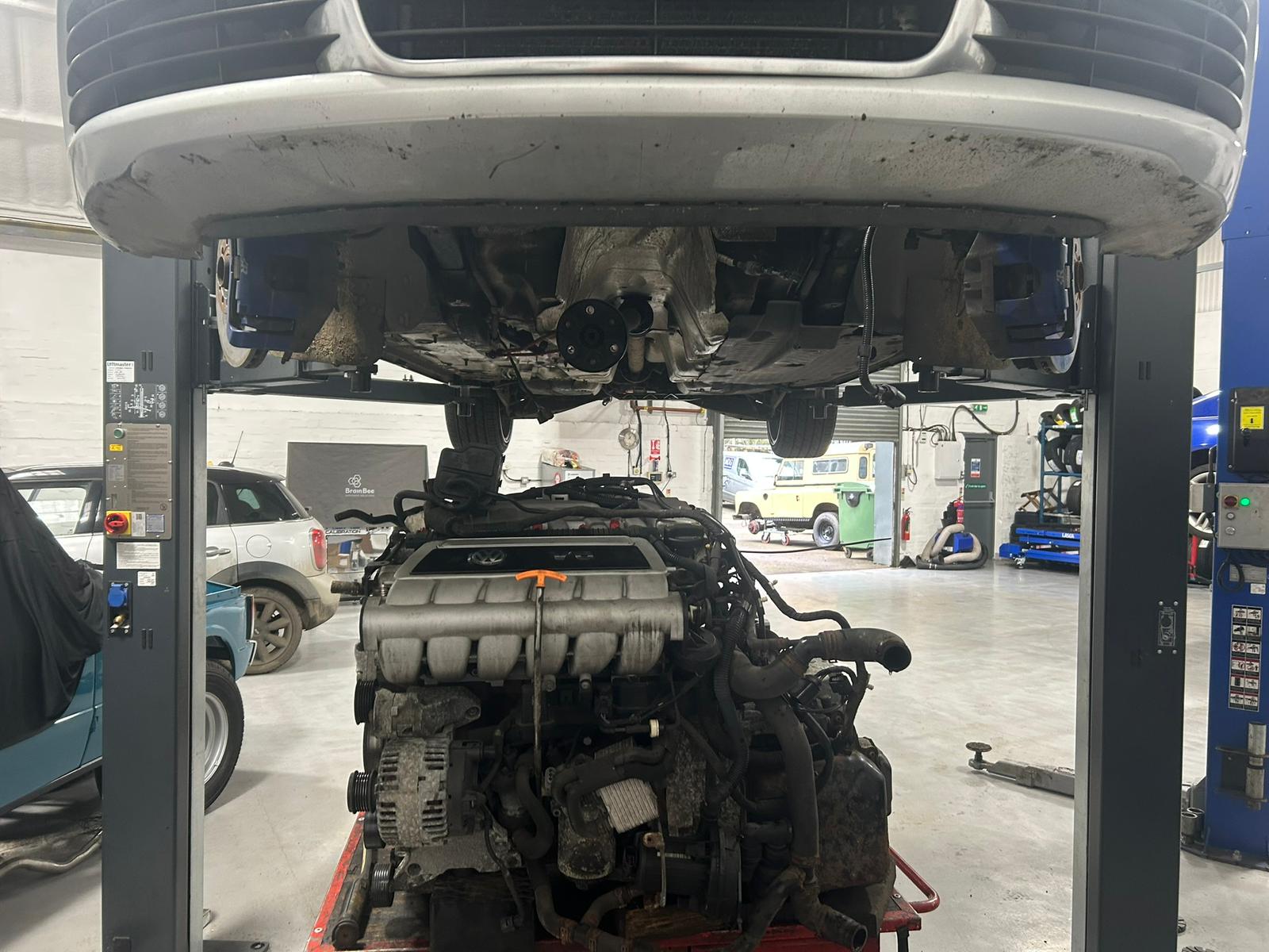 Vehicle raised for underside inspection and repair